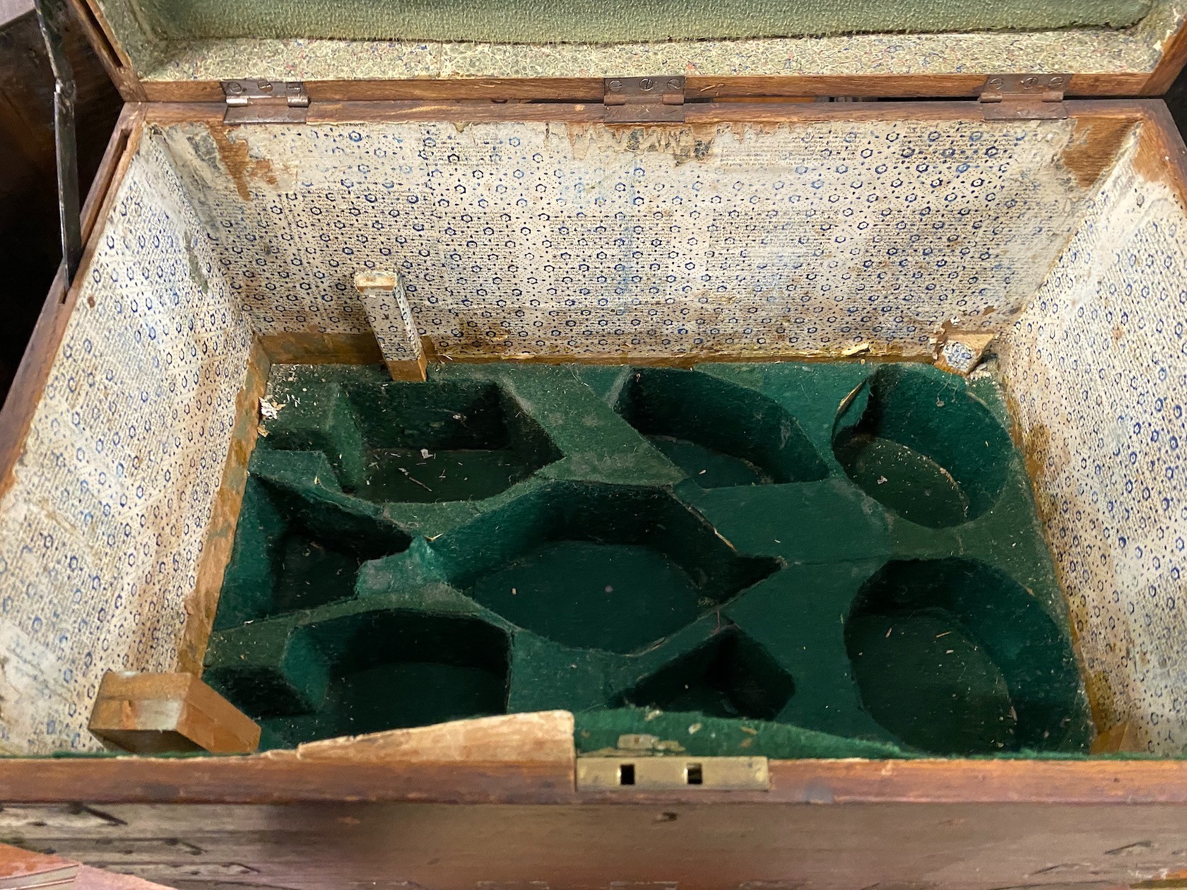 A Victorian iron bound oak silver chest with three interior trays housing assorted silver plated flatware, width 64cm, depth 41cm, height 51cm